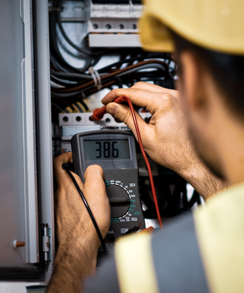 professional performing electrical maintenance work